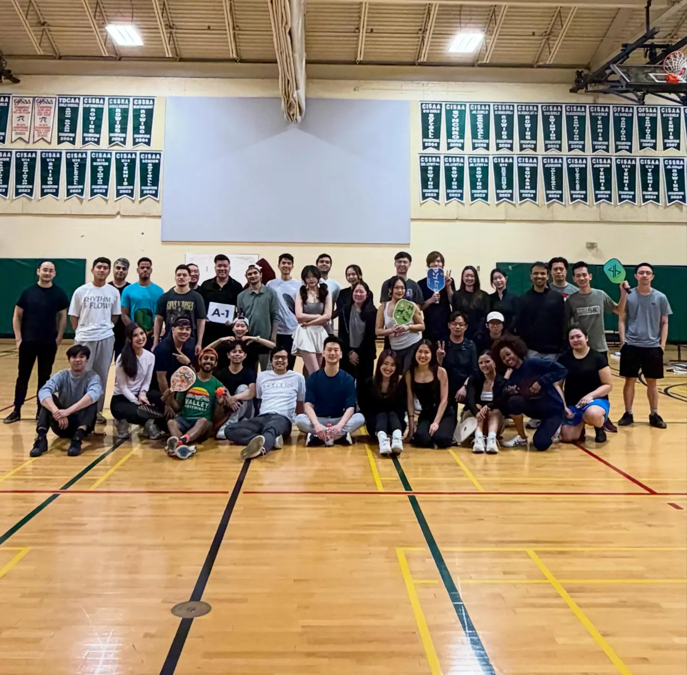 A packed pickleball session on the indoor courts at Branksome Hall